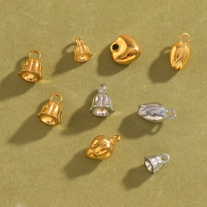 Détails de pendentifs en forme de cœur et muguet en acier inoxydable doré et argent