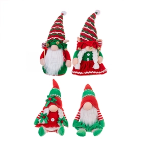 Set of four festive Christmas gnomes with striped hats in red, green and white colors