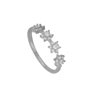 Macro detail of silver S925 sterling silver snowflake ring with four sparkling zircons
