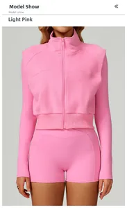Gilet de sport en polaire rose clair avec col montant et fermeture éclair pour femme