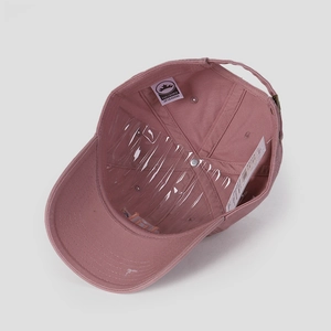 Internal view of dusty pink cotton baseball cap with sweatband and brand label detail
