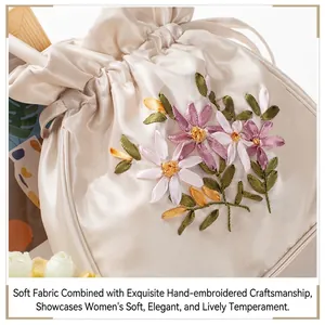 Handcrafted silk embroidery pouch with floral ribbon patterns in beige satin finish