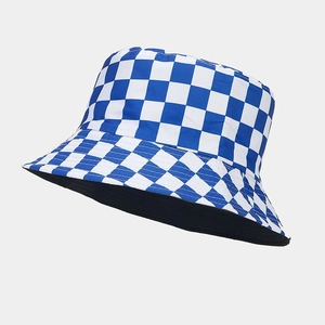 Detail of blue and white checkered bucket hat with black inner lining and fabric texture