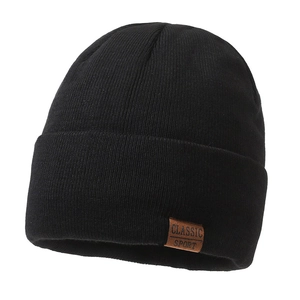 Classic black knitted beanie with a brown leather logo tag for winter windproof warmth