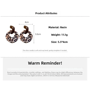 Detail view of leopard print acrylic resin earrings with dimensions and 11.1g weight