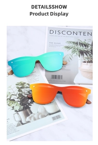 Detailed macro view of handmade wooden temples with engraving on stylish polarized sunglasses