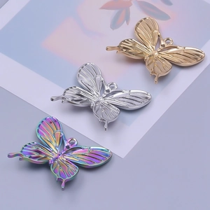 Three-color butterfly pendants in gold, silver, and rainbow steel for DIY jewelry