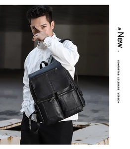 Close-up of a stylish black PU leather backpack worn by a male model in a city setting