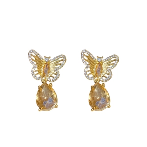 Boucles d'oreilles papillon vintage dorées avec cristaux gouttes de champagne