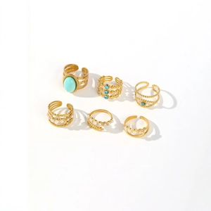 6-piece gold boho ring set with turquoise and pearls featuring adjustable open bands