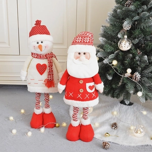 Bambole di Natale in maglia Babbo Natale e pupazzo di neve con gambe lunghe a righe