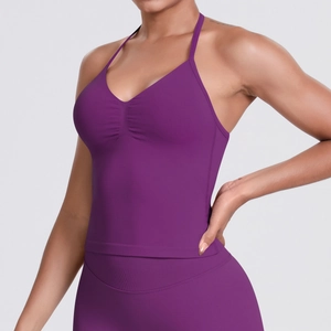 Close-up of seamless knitted purple yoga top with ruched chest detail and thin straps