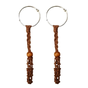Boucles d'oreilles bohèmes marron faites main avec anneaux argentés et perles en bois