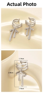 Detail showing dimensions of silver bow tassel ear cuffs with triple-layer wrap design