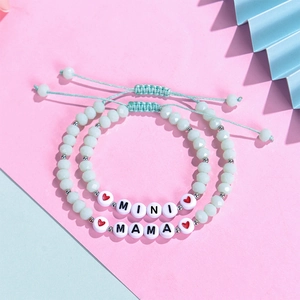 Matching MAMA and MINI faceted bead bracelets with adjustable braided cords and charms