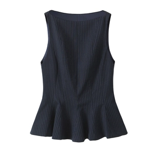 Detail of navy blue pinstripe peplum top showing sleeveless slim fit and ruffled hemline