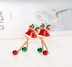 Detail of Christmas bell earrings with red enamel, gold bows, and sparkling rhinestones