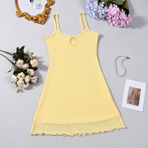 Detail of light yellow V-neck dress with ruffle trim and hollow-out chest design