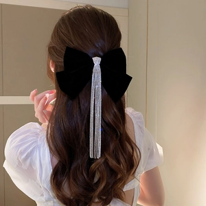 Elegant black velvet bow hair clip featuring luxury rhinestone tassels for back of head styling