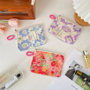 Floral canvas pouch set with zip closure and wrist straps for cosmetics and coins