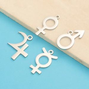 Polished stainless steel pendants featuring male female and astrology symbols