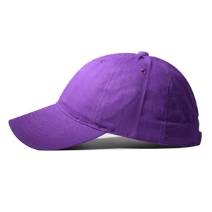 Detail shot of purple cotton twill baseball cap showing side profile and stitched brim