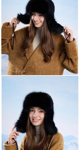 Detail view of plush black faux fur winter trapper hat with soft ear flaps and ties