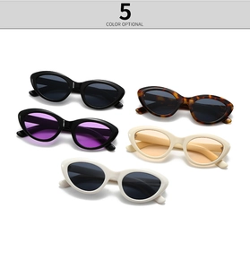 Detail view of five trendy marble pattern oval sunglasses in assorted frame colors