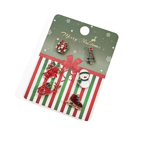 Détail d'un ensemble de 6 broches de Noël avec bonhomme de neige et renne sur carte cadeau