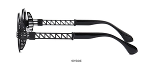 Detailed side view of black punk style sunglasses with geometric hollow frames
