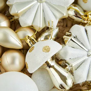 Champagne gold and cream white Christmas ornament set with glitter and matte finishes