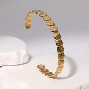 Minimalist 18k gold plated stainless steel open cuff bracelet with layered leaf pattern
