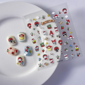 Detail of 5D strawberry rabbit nail stickers with embossed Sanrio characters on white tray