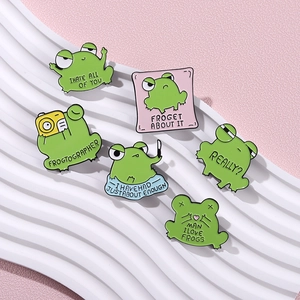 Set of 6 cartoon frog enamel pins with humorous English quotes on pink background
