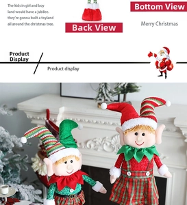 Detail of plush Christmas elf dolls with plaid outfits and long striped hats for home decor