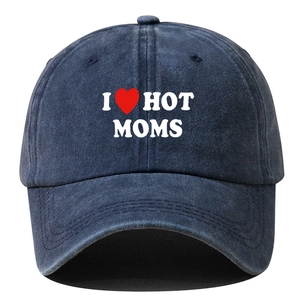 Detailed close-up of dark blue washed denim baseball cap with I Love Hot Moms embroidery