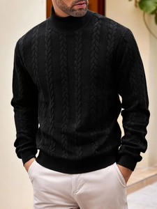 Detail shot of men's black turtleneck sweater featuring premium cable knit texture