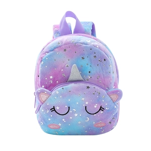 Detail of plush unicorn backpack with tie-dye faux fur and silver sequin star embroidery