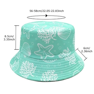 Mint green reversible sun hat with starfish print and precise size measurements