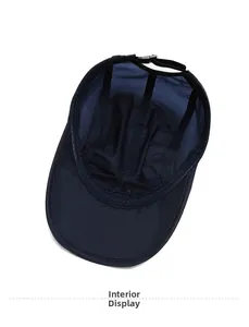Detailed interior of navy baseball cap featuring breathable mesh and adjustable strap