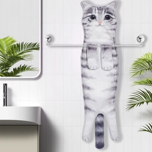 Detailed view of the realistic grey tabby cat hand towel hanging on a bathroom metal rack