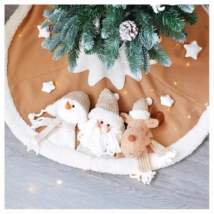 Detail of plush Christmas tree skirt with 3D snowman, Santa and reindeer knit dolls