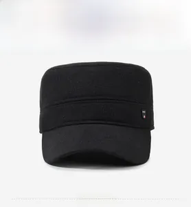 Front view of black flat top military cap with SPORT side label and woven texture