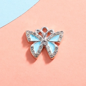 Blue butterfly charm pendant with crystals and silver base for DIY jewelry making