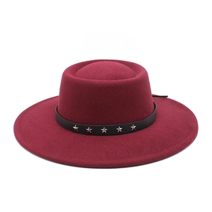 Burgundy wool felt fedora hat with wide brim and black band featuring silver star studs