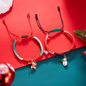 Christmas woven magnetic couples bracelets with Santa and snowman charms on gift card