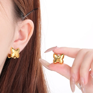 Minimalist 3D butterfly hoop earrings in polished gold finish for women