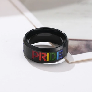 Men's black brushed stainless steel Pride ring with colorful rainbow PRIDE engraving