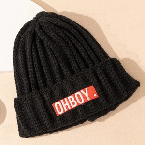 Black ribbed knit beanie with OHBOY patch embroidery for winter warmth