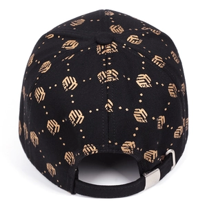 Detail view of the black baseball cap back with gold embroidery and adjustable metal buckle